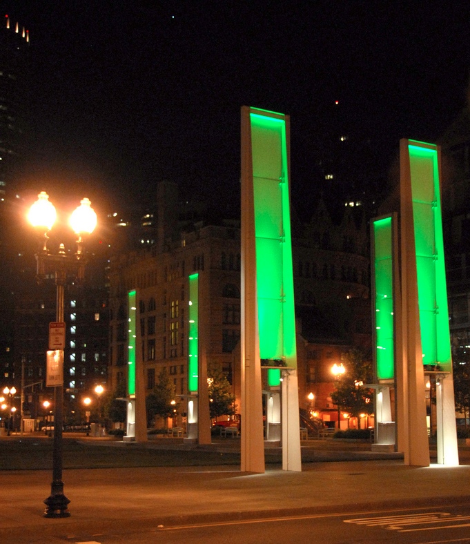 6 green steel blades, 20 feet high, aimed at the sky